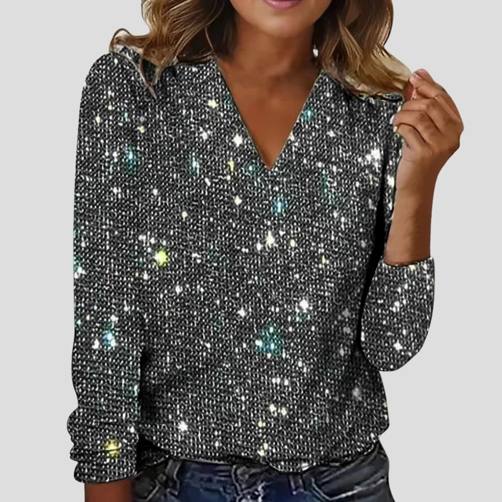 GLITTERNAT pailletbluse i guld med V-hals set forfra
