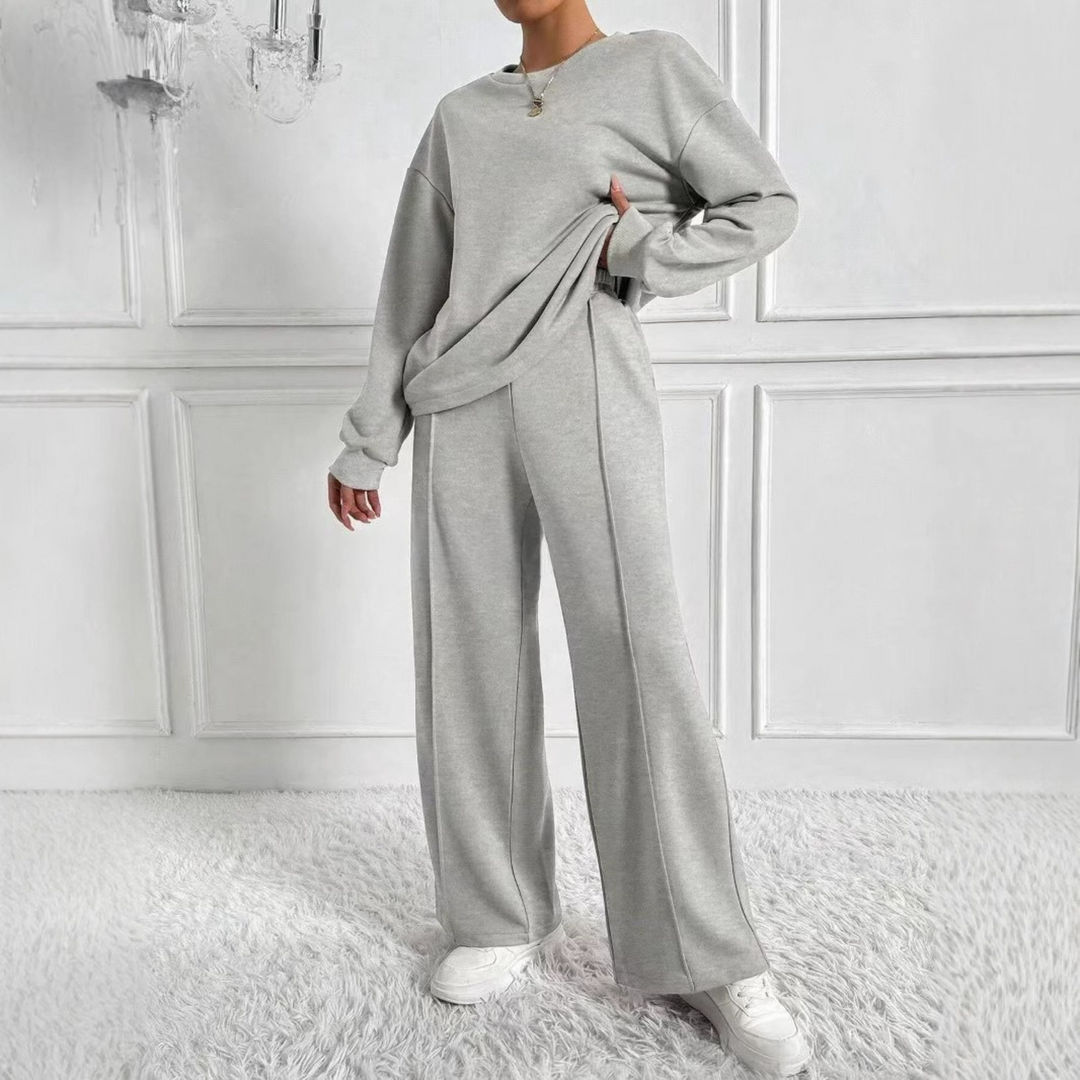 Todelt sweatsæt til damer med sweatshirt og højtaljede bukser