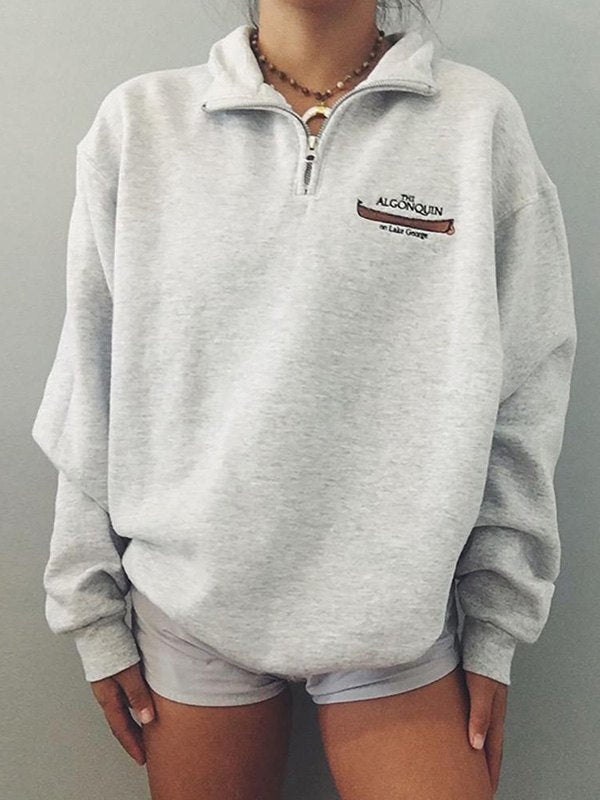 Gråt retro sweatshirt med halv lynlås i kraven