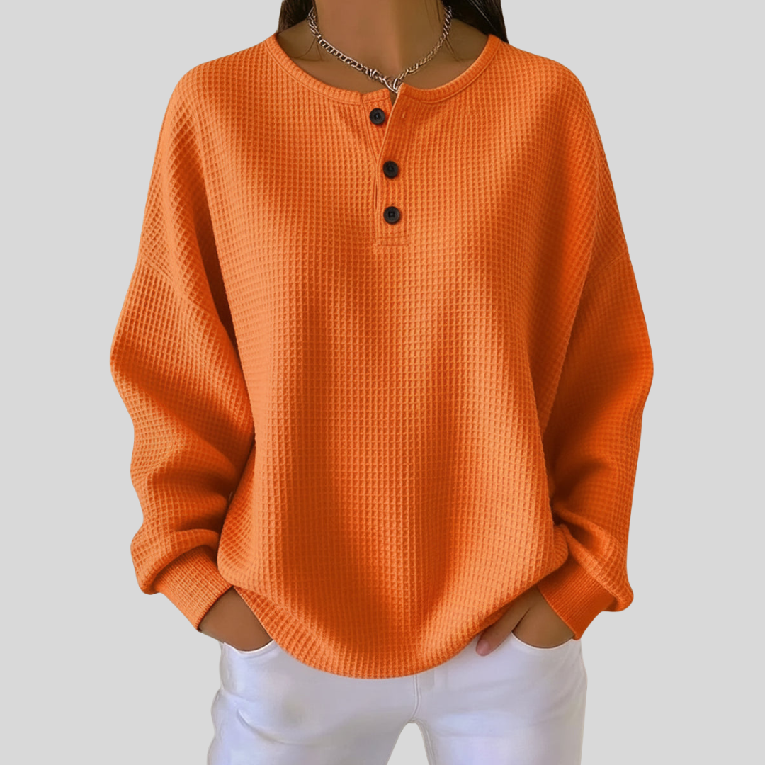 Tyk sweatshirt til damer i vaffelstof med krave set forfra